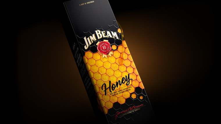 金黃色六邊形圖案 Jim Beam 蜂蜜包裝設計，極具食欲感