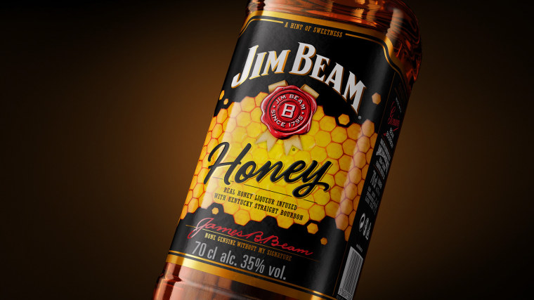金黃色六邊形圖案 Jim Beam 蜂蜜包裝設計，極具食欲感
