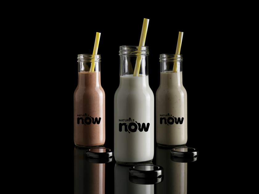 Naturals Now 黑白風格冰淇淋包裝設(shè)計,像奶油流動的白色大寫字母now Naturals Now 黑白風格冰淇淋包裝設(shè)計,像奶油流動的白色大寫字母now